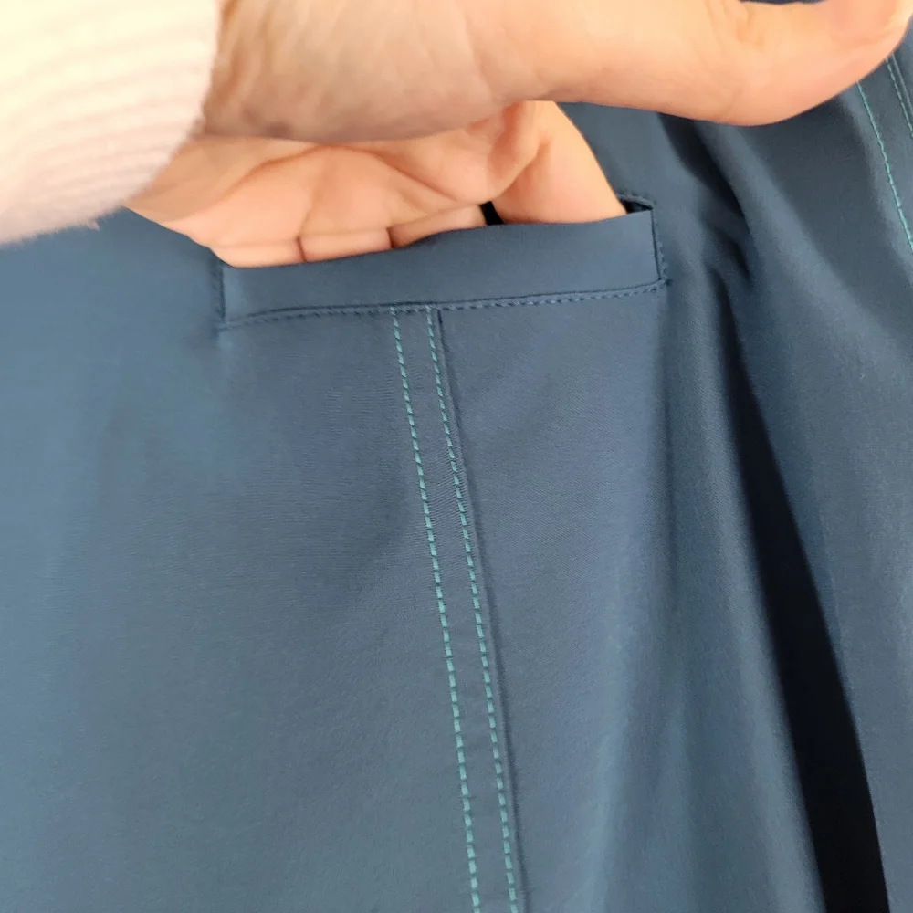 TITLE NINE Swingtastic teal Nimblene stretch UPF 50 athletic quick-dry skort